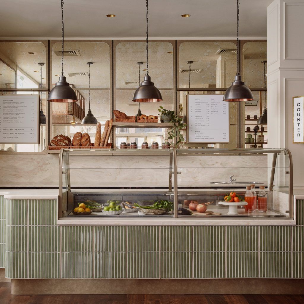 Interior photo of the cafe showcasing a shelf with various products.